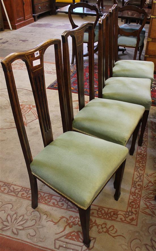 Set of four Edwardian inlaid high-back dining chairs with pierced splats and pale-green upholstered stuff-over seats